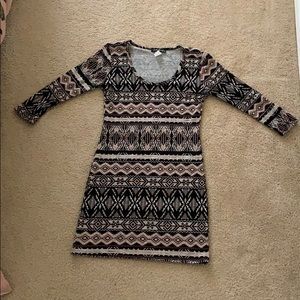 Aztec designed pink body-con dress.Quarter sleeve